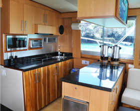 tv area and reading area , altamar galapagos islands